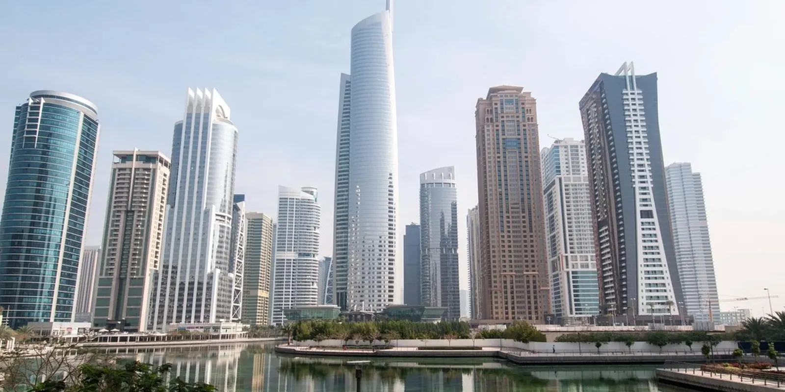City towers reflected in the water
